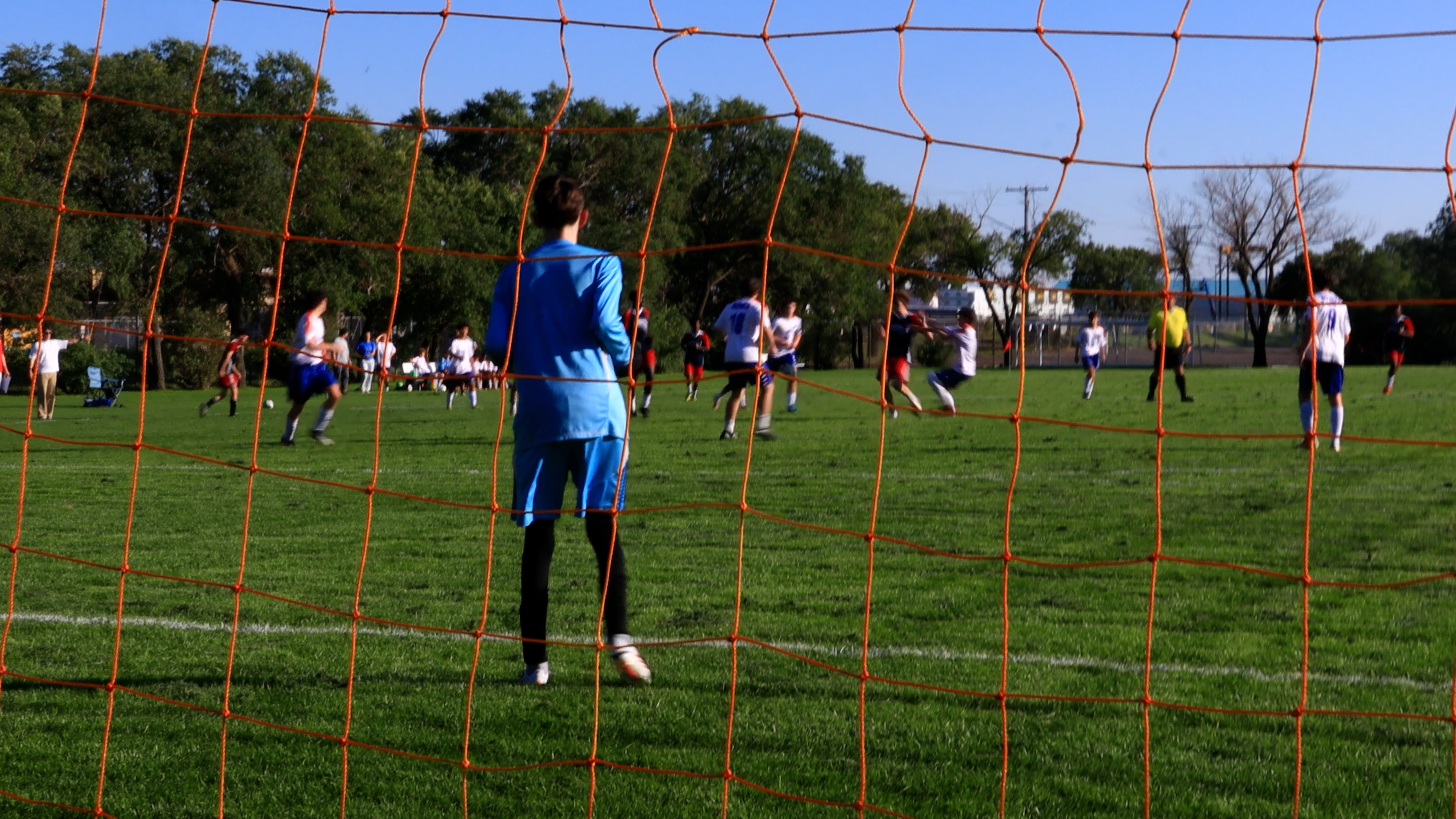 The view from behind the net on the soccer pitch
